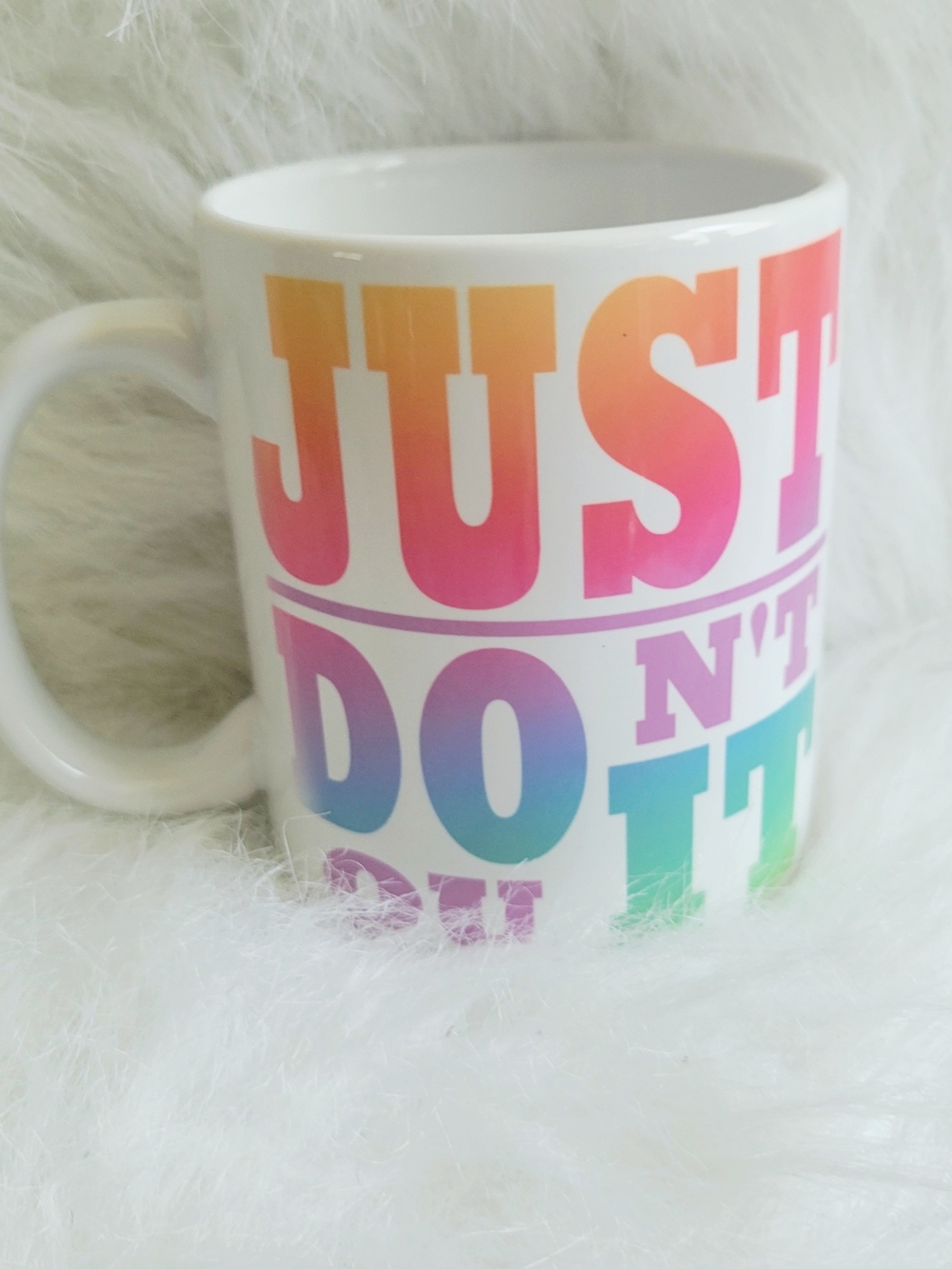 White Ceramic Mug with Rainbow Ombre 'Just Don't Quit' Text